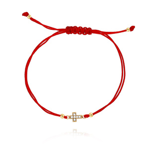 Bransoletka złota 585 na czerwonym sznurku krzyżyk z cyrkoniami