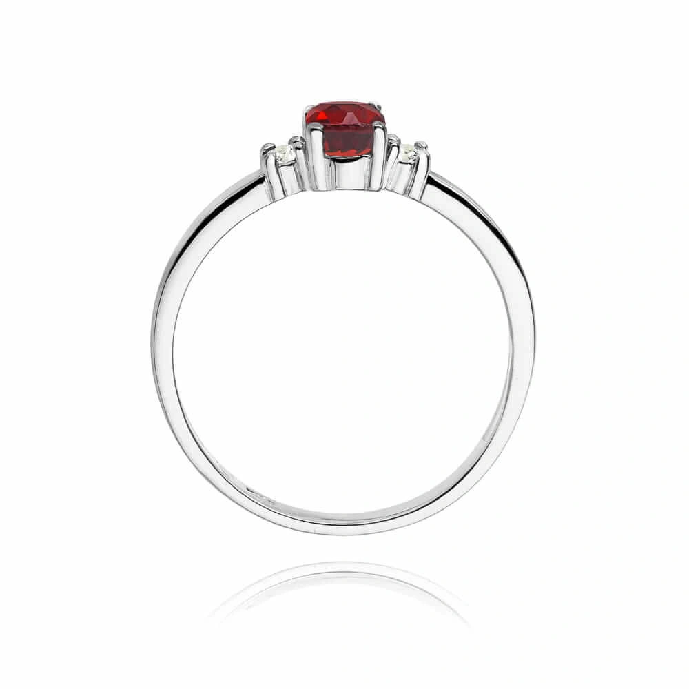 Złoty pierścionek zaręczynowy z dużym rubinem 0,60 ct i diamentami 0,08 ct białe złoto