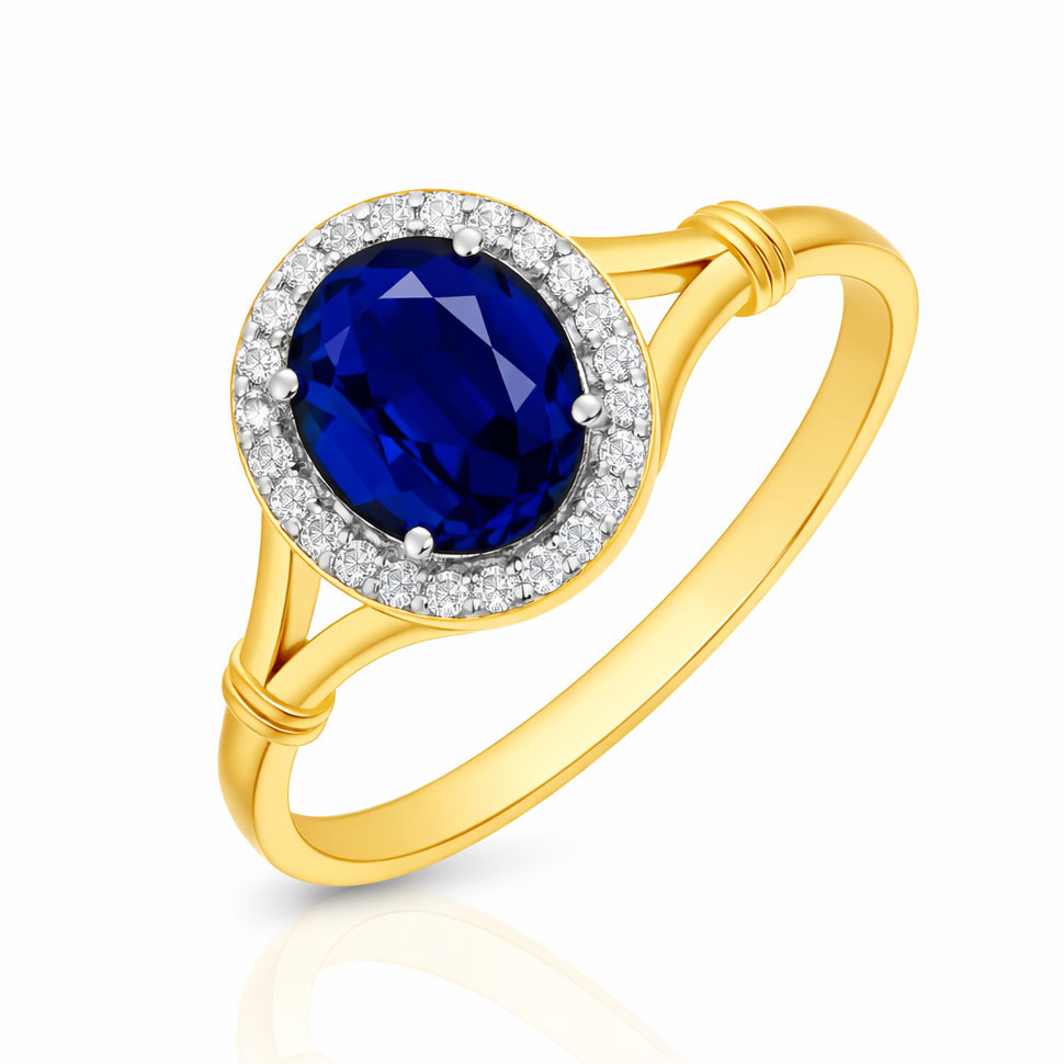 Złoty pierścionek z szafirem 585 owalny szafir diamenty naokoło
