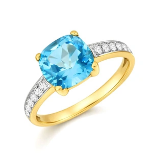 Złoty pierścionek z topazem 585 topaz 2,865 ct diamenty 0,17 ct 