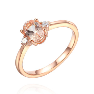 Złoty pierścionek 585 morganit 0,65 ct diamenty 0,08 ct różowe złoto
