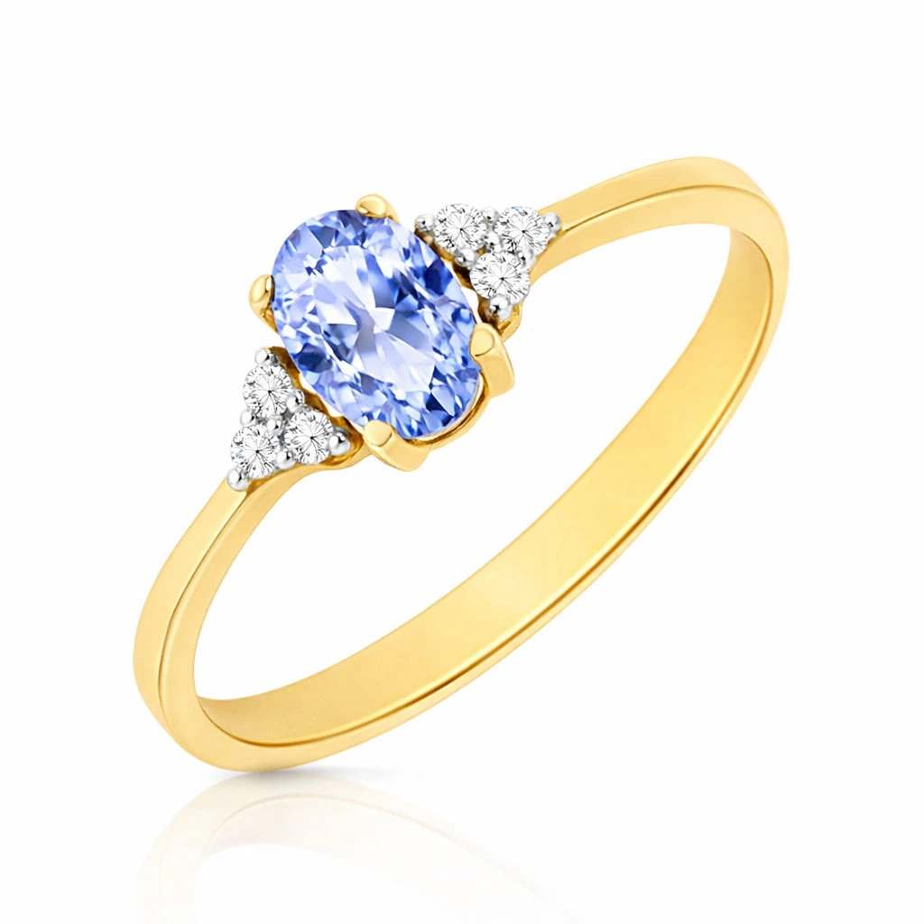 Złoty pierścionek 585 tanzanit 0,4-0,6 ct diamenty 0,065 ct