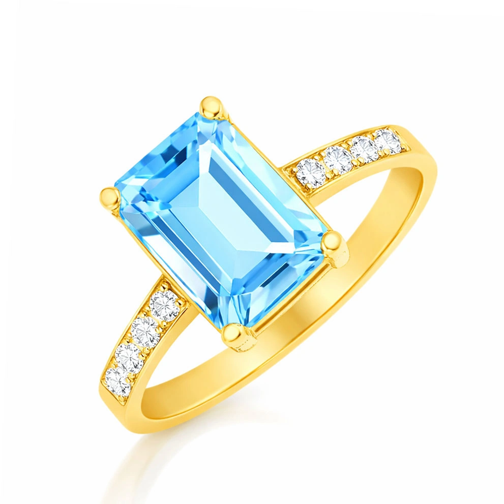 Złoty pierścionek 585 topaz oktagon 1,70 ct diamenty 0,125 ct