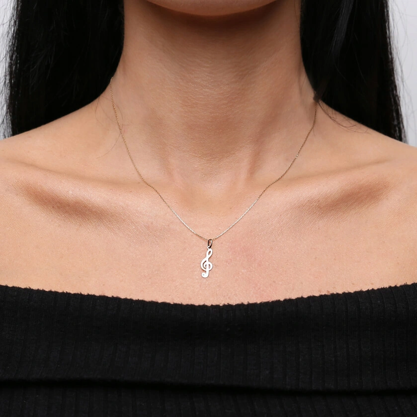 Złota zawieszka klucz wiolinowy z brylantem 585 diament 2,2 cm