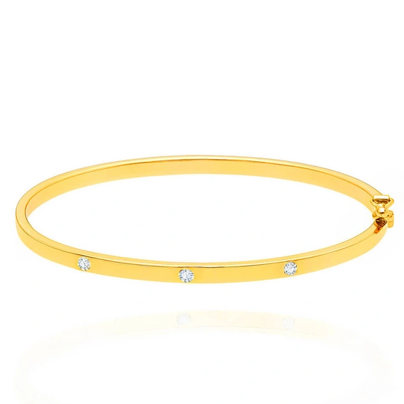 Złota bransoletka bangle 585 sztywna cyrkonie gładka na zatrzask 