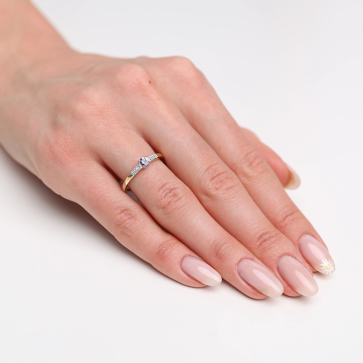 Pierścionek złoty 585 tanzanit 0,17 ct diamenty 0,06 ct