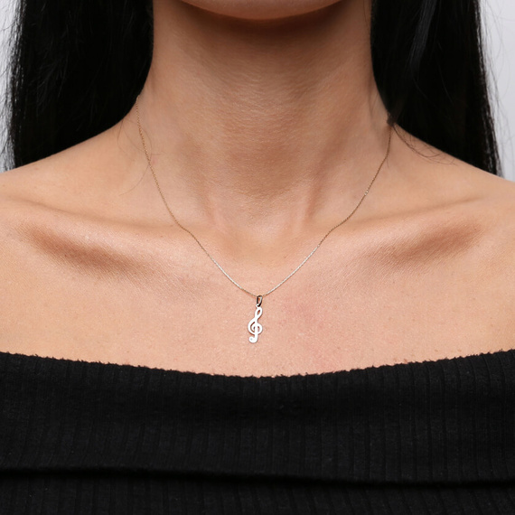 Złota zawieszka klucz wiolinowy z brylantem 585 diament 2,2 cm 