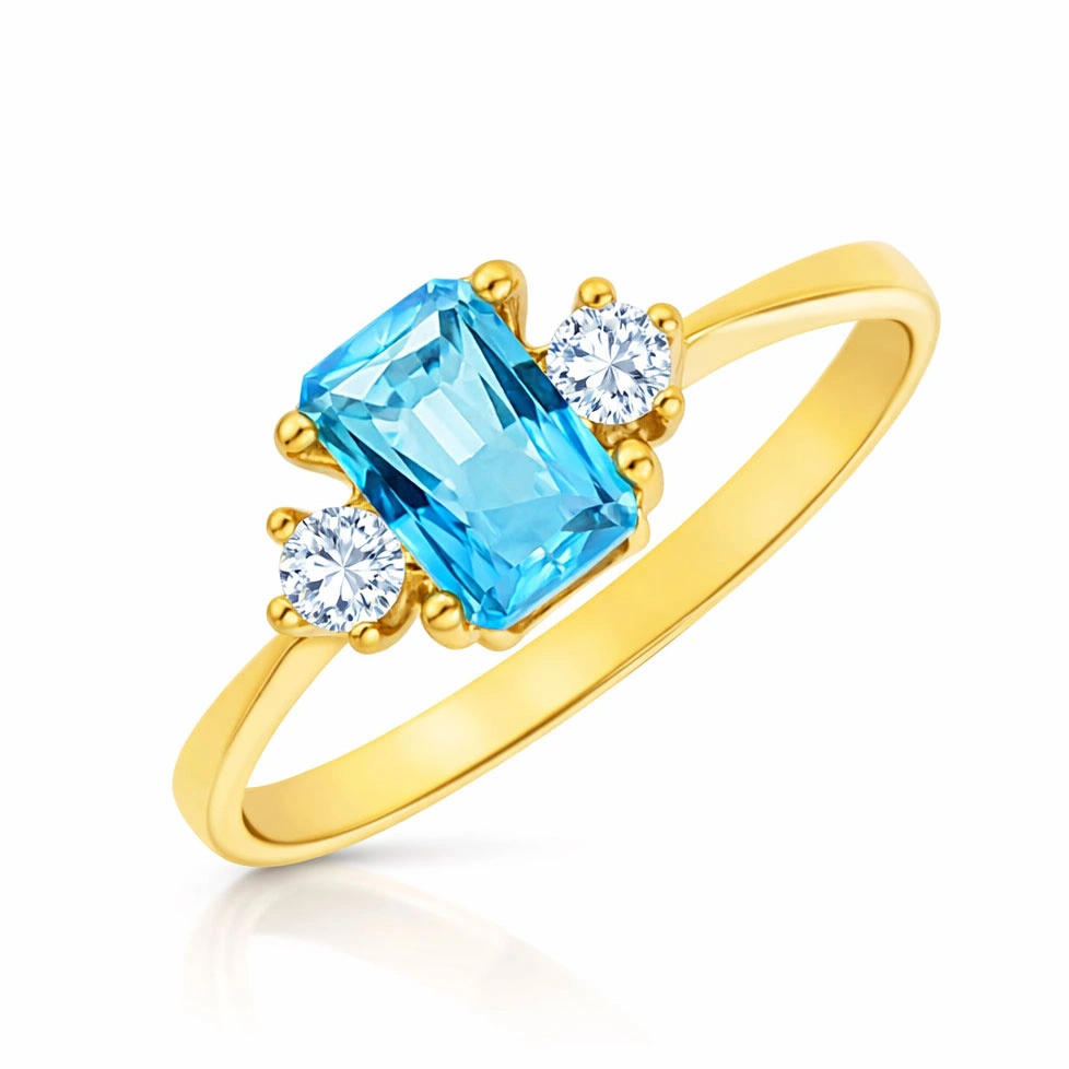 Złoty pierścionek z topazem 585 topaz oktagon 0,75 ct diamenty 0,095 ct
