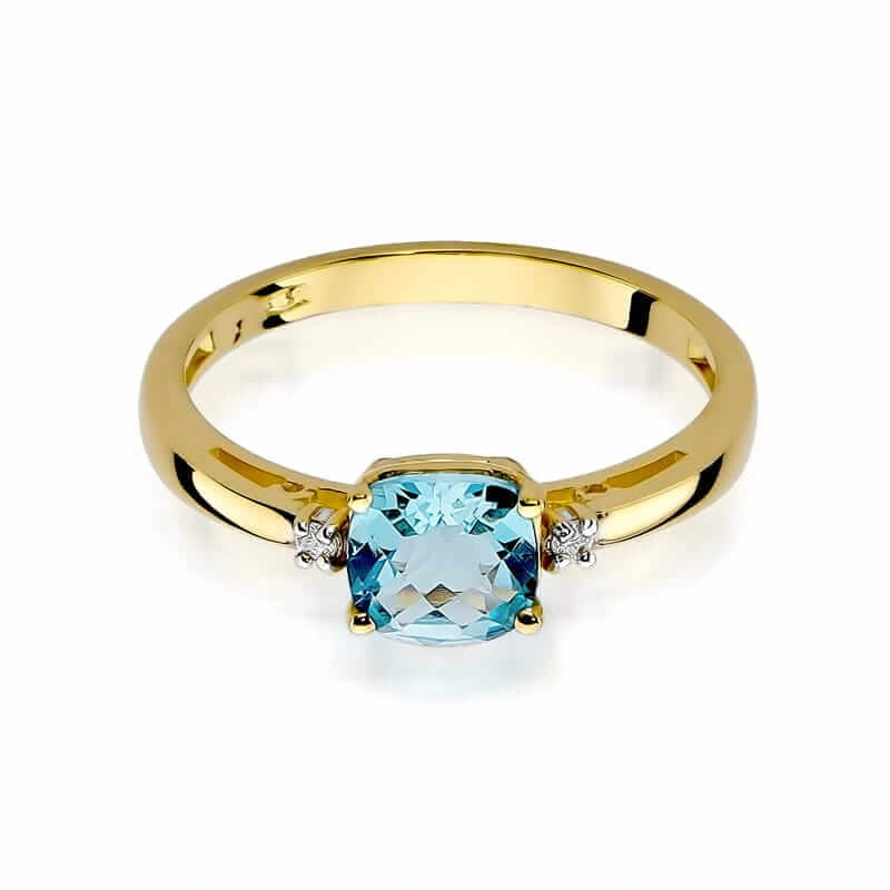 Złoty pierścionek 585 topaz 0,70 ct z diamentami 0,03 ct