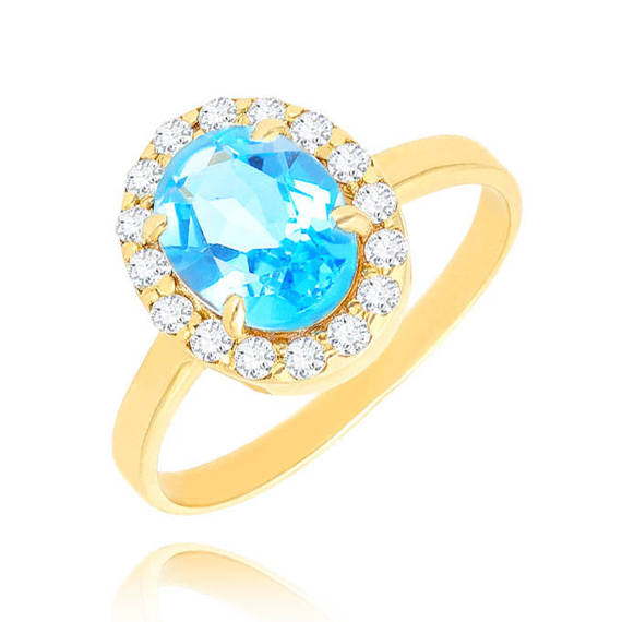 Złoty pierścionek owalny 585 topaz 2,10-2,40 ct diamenty 0,325 ct